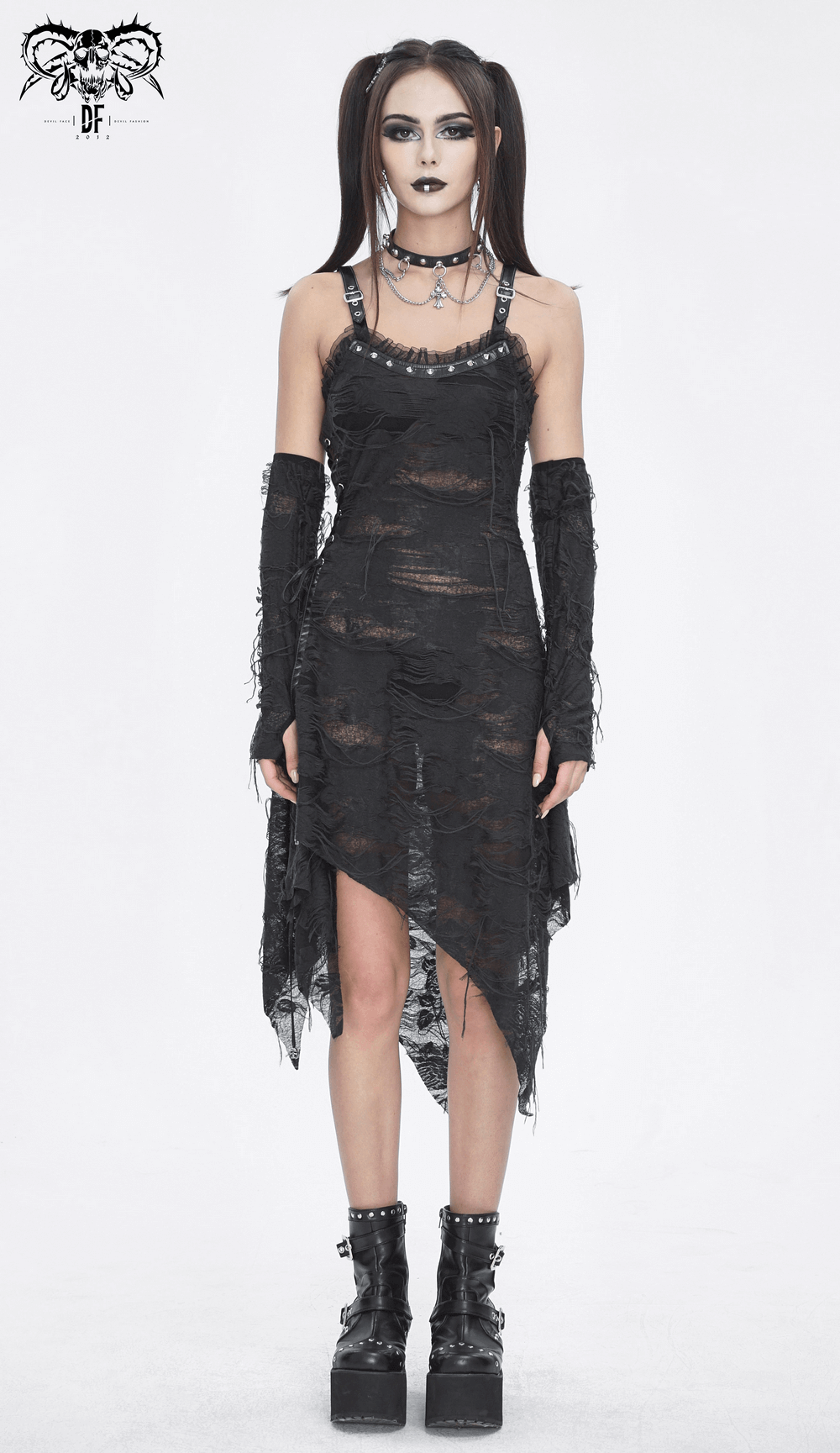 Gothic punk women's black ripped dress with long gloves, asymmetrical hem, and stylish platform boots.