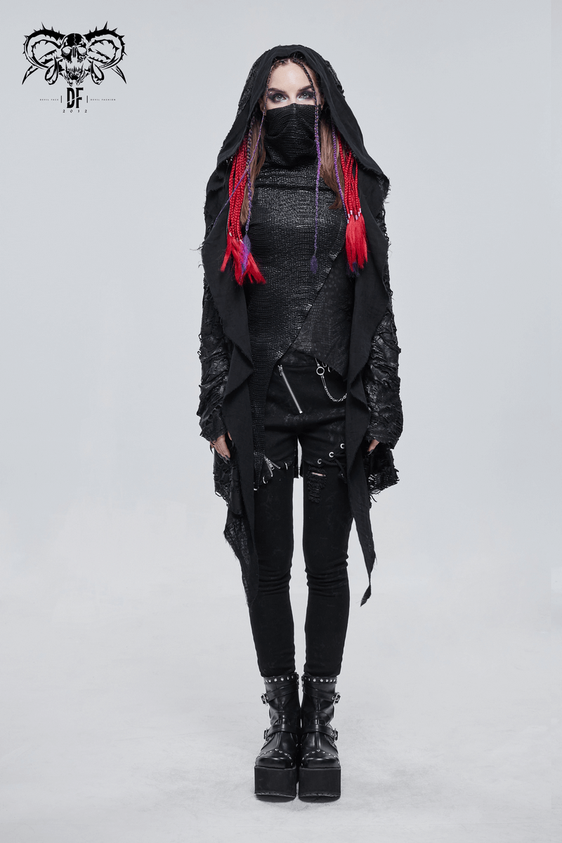 Gothic punk woman in black irregular hooded trench coat and stylish pants, showcasing a bold alternative fashion look.