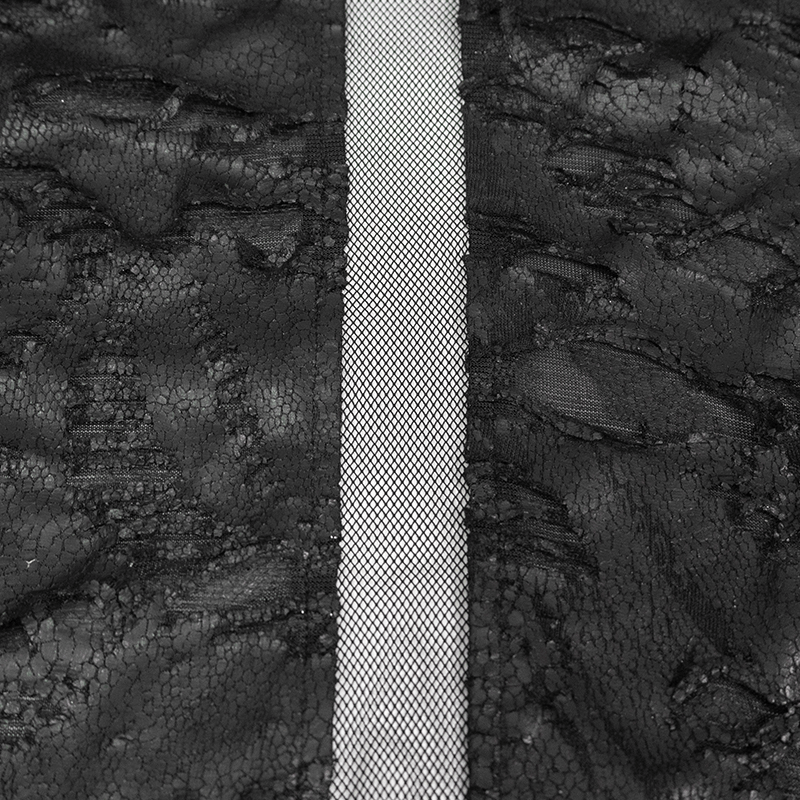 Close-up of gothic black lace fabric with a silver mesh stripe detail, perfect for stylish cape designs.