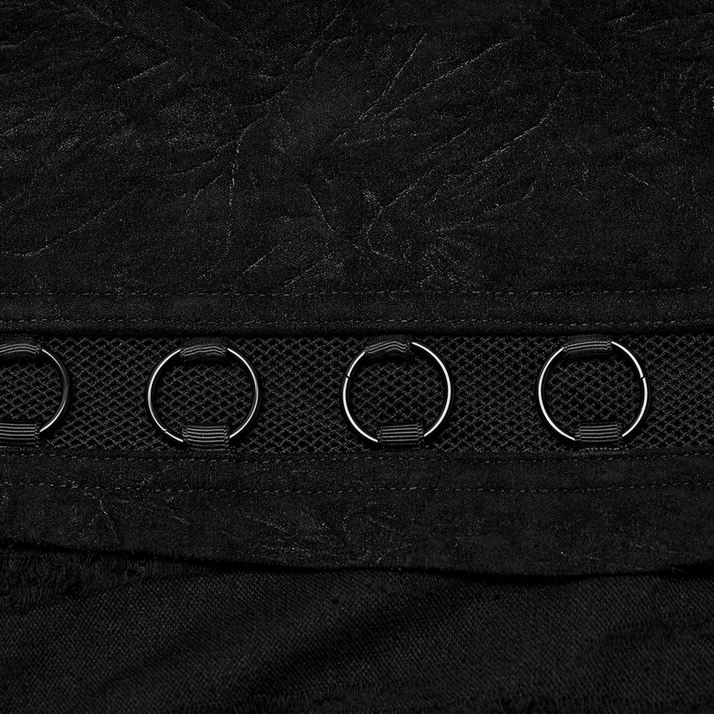 Close-up of Gothic Punk skirt featuring black textured fabric and metallic loop accents for an edgy look.