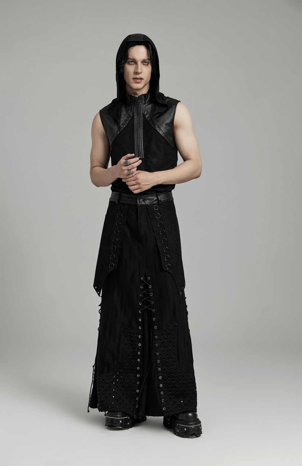 Edgy Gothic Punk Layered Skirt with metallic accents, designed for rebellious men, showcasing a bold fashion statement.