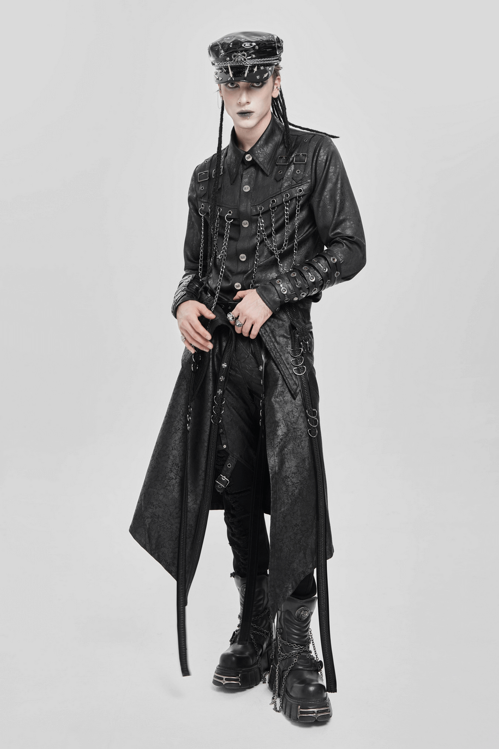 Gothic Punk Layered Strap Skirt with Zippers and Rings styled with edgy accessories and platform boots.