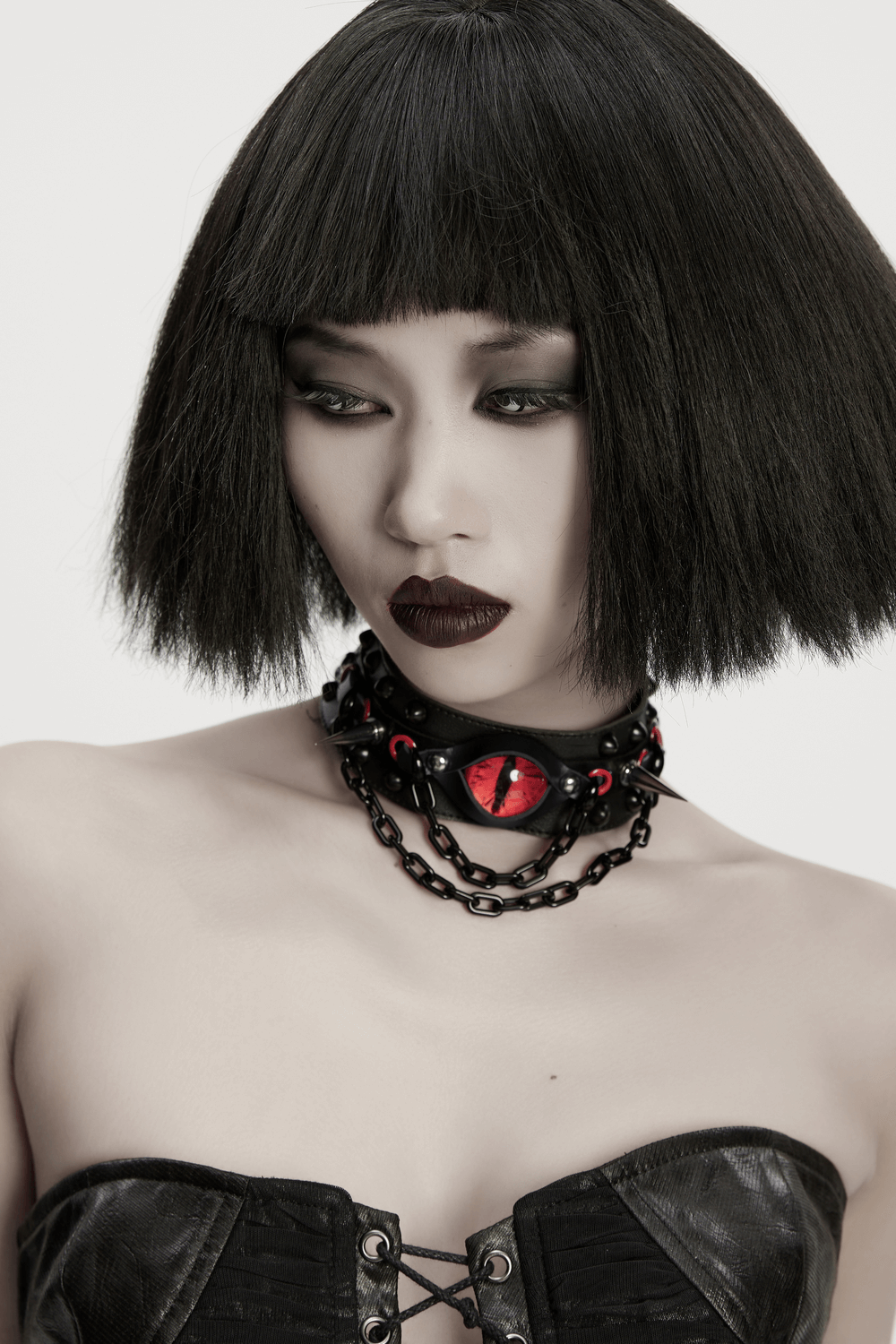 Gothic Punk Leather Choker with Demon Eye and Chains worn by model showcasing punk style and bold fashion.
