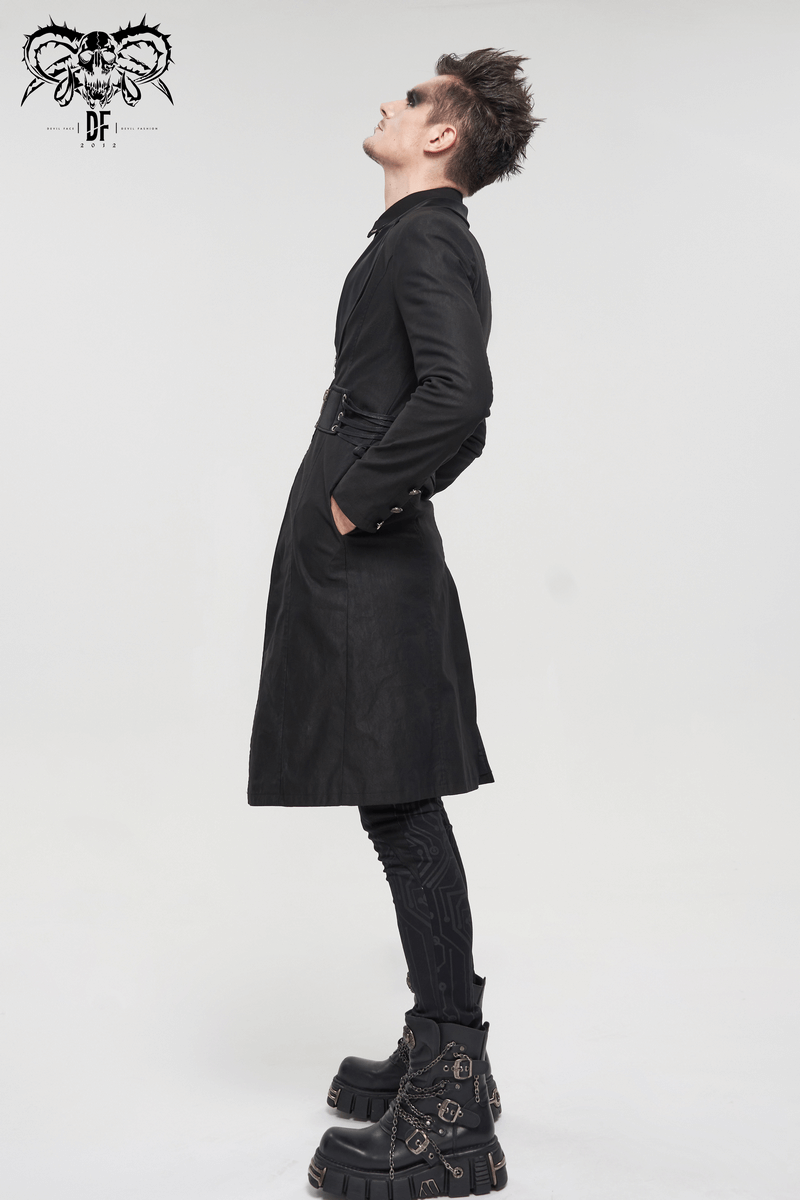 Men's gothic punk mid-length black coat showcasing a slim fit design, paired with stylish platform boots.