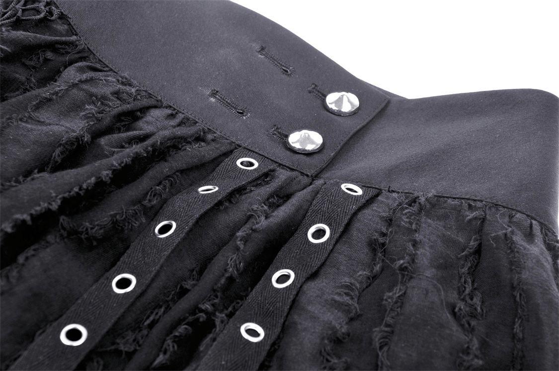 Close-up of Gothic punk mini skirt showcasing fringe trim and silver button accents.