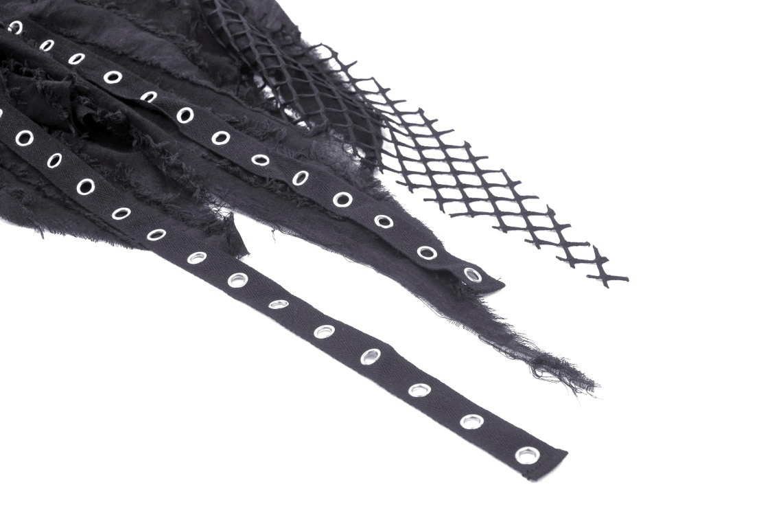 Close-up of black fishnet and fringe accents from a Gothic punk mini skirt, showcasing edgy design details.