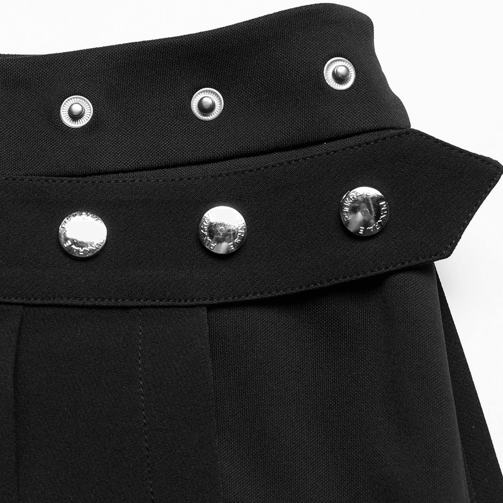 Close-up of the gothic punk mini skirt's button details and waistband with silver studs.