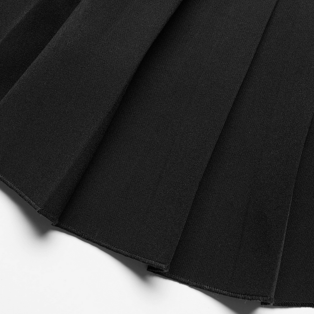 Close-up of the pleats on a Gothic Punk plaid mini skirt in black fabric, showcasing its edgy design and texture.