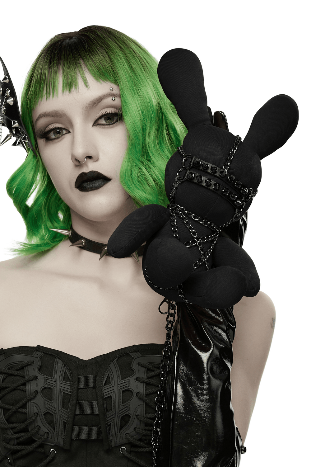 Gothic Punk Rabbit Doll and Body Chain Accessory held by model with green hair in edgy outfit.