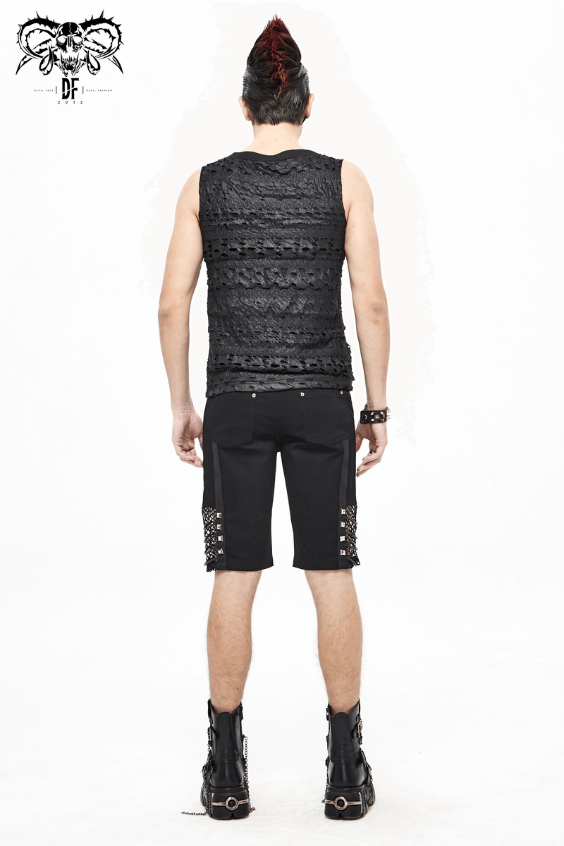 Men's gothic punk shorts featuring mesh inserts and rivets, styled with a sleeveless top and boots, perfect for alternative fashion.