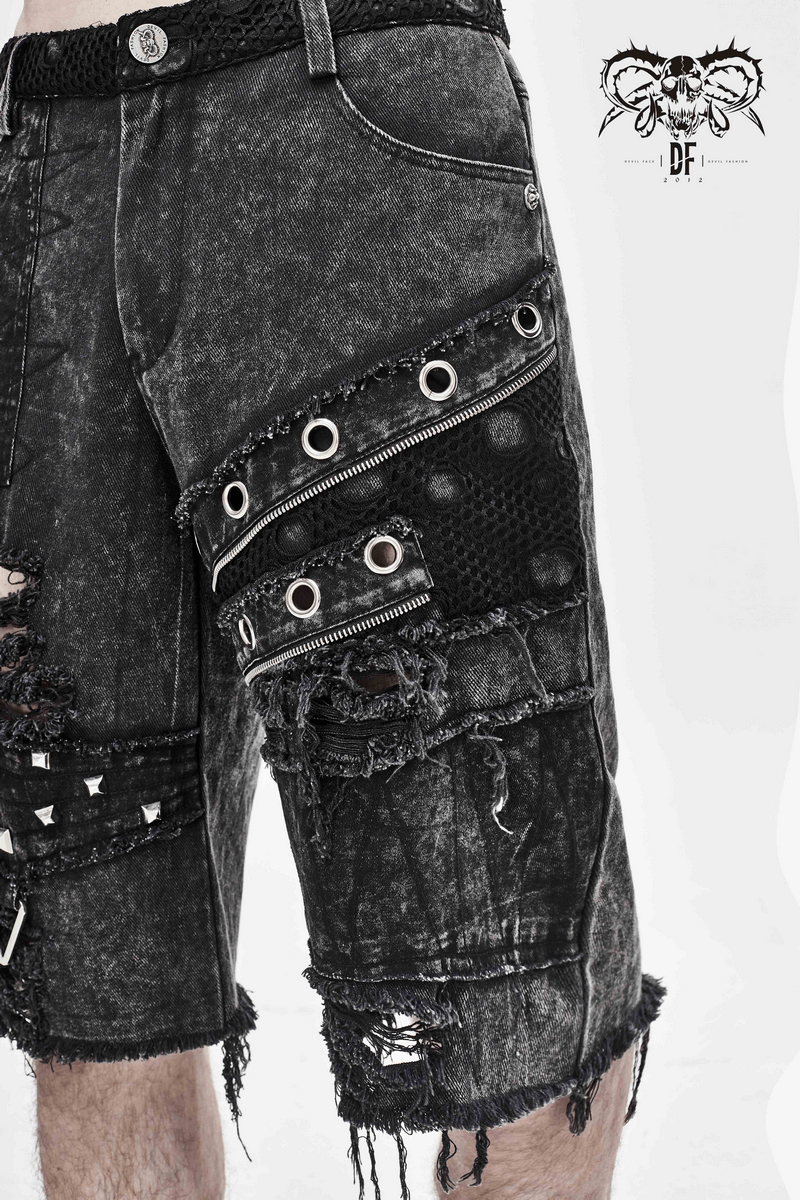 Gothic punk ripped shorts for men with decorative zippers and silver rivets, featuring distressed black denim.