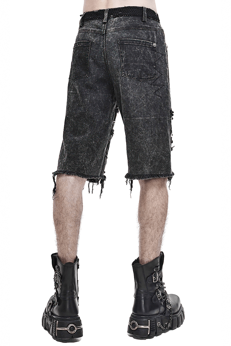 Men's Gothic punk black denim ripped shorts with decorative rivets, viewed from the back.