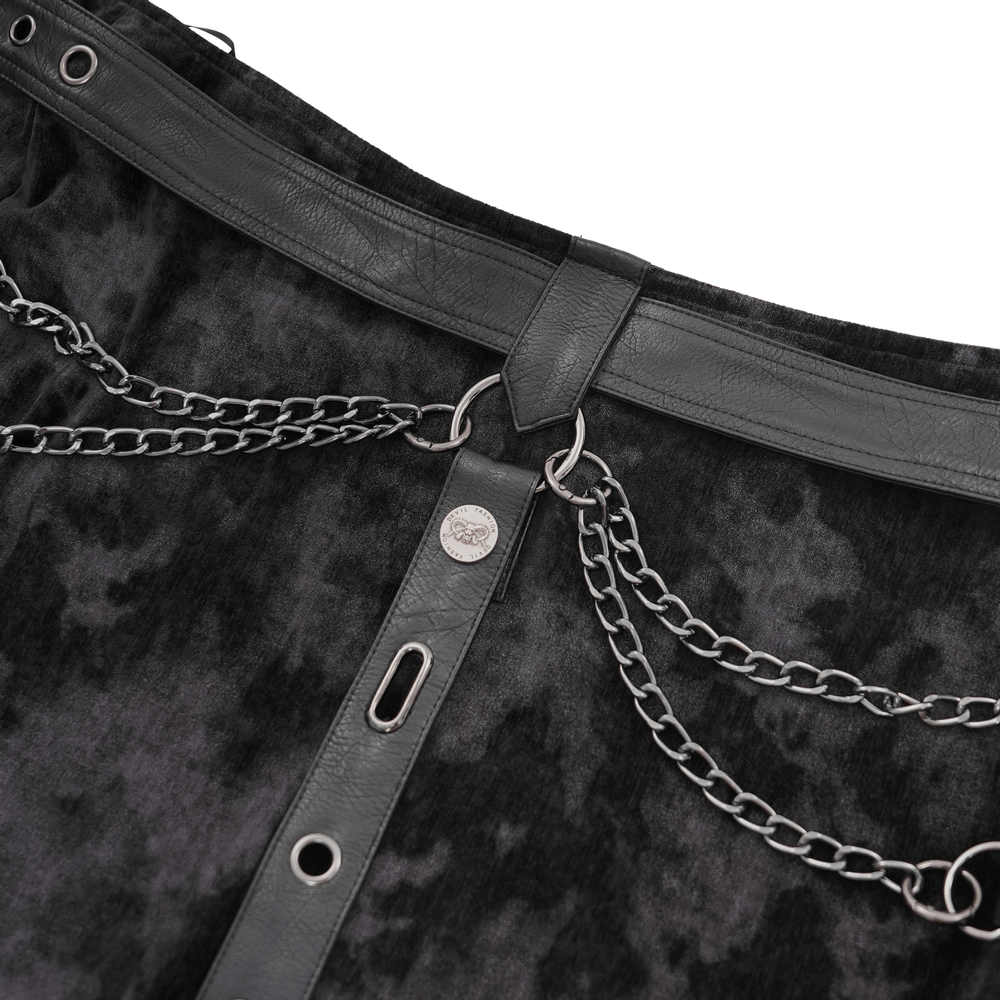 Close-up of gothic punk skirt with detachable chains and leather waist straps, featuring textured fabric design.