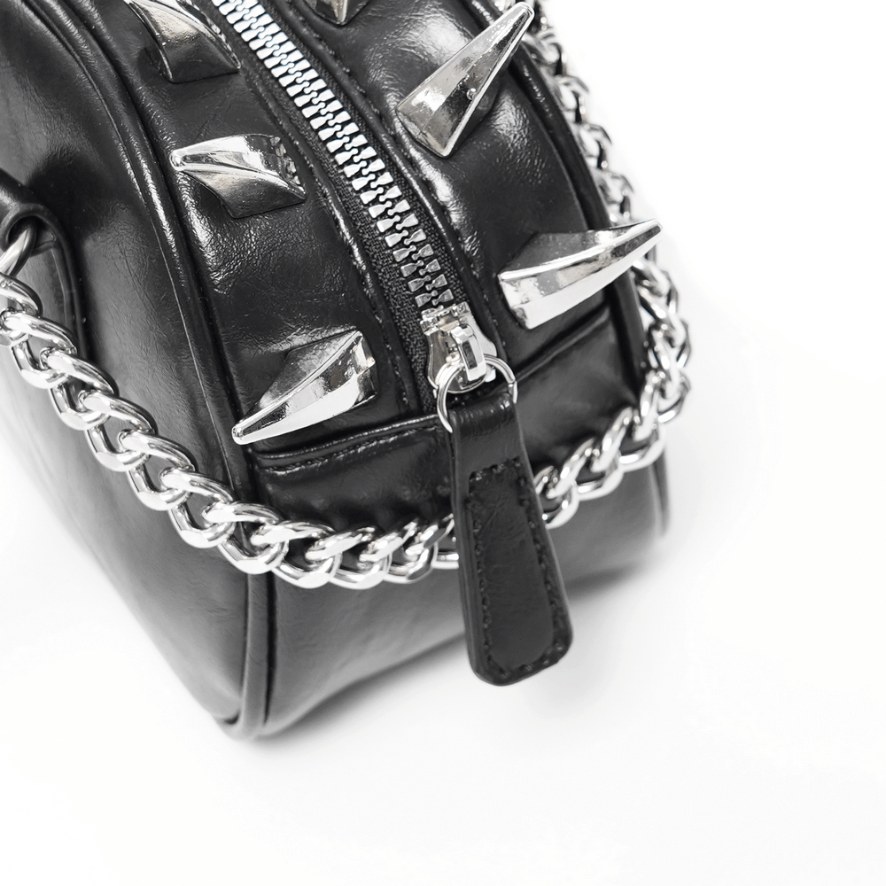 Gothic punk skull handbag with silver spikes and a stylish chain strap, perfect for alternative fashion lovers.