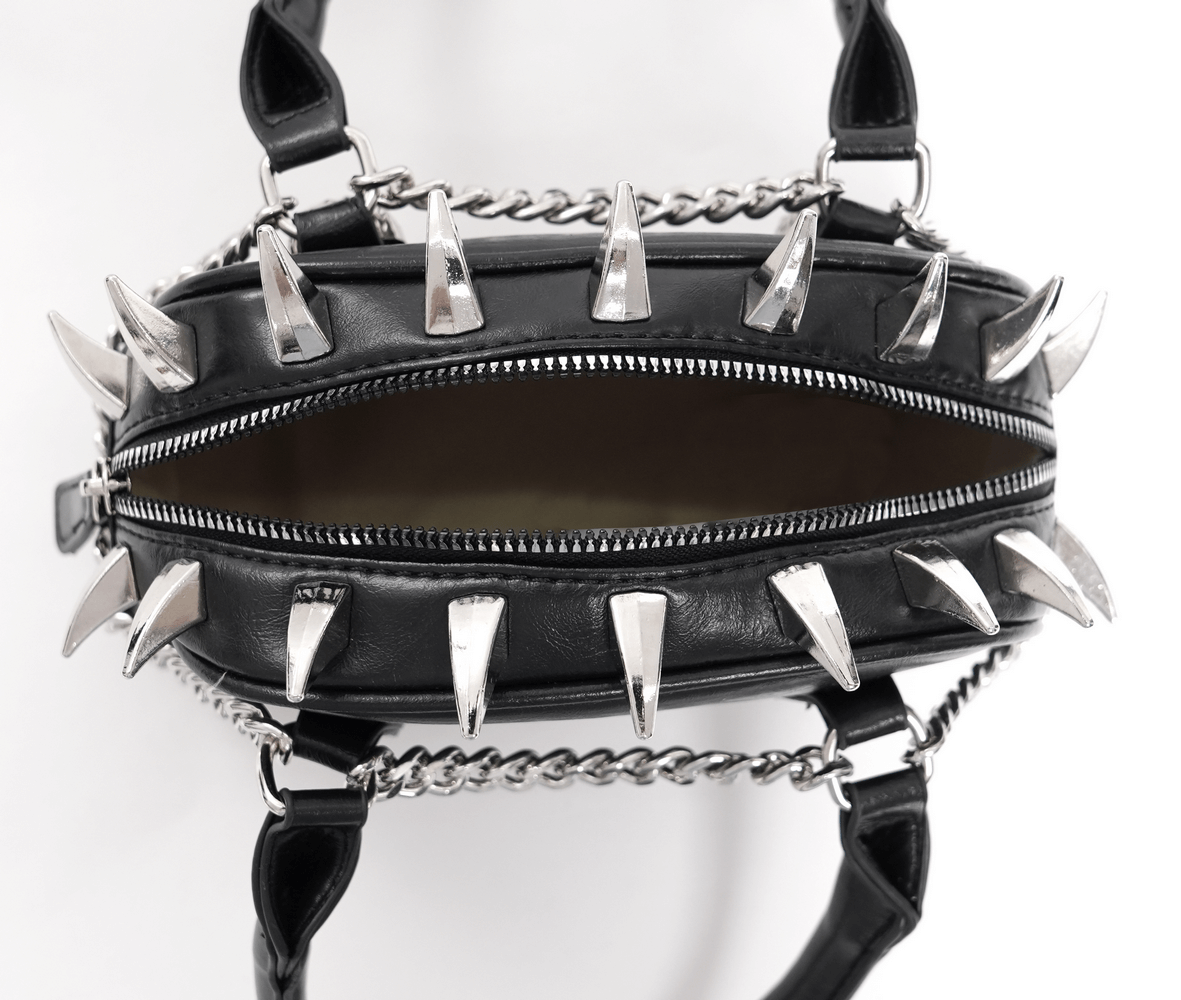 Gothic punk skull handbag with spikes and chain strap, showcasing edgy design and spacious interior.