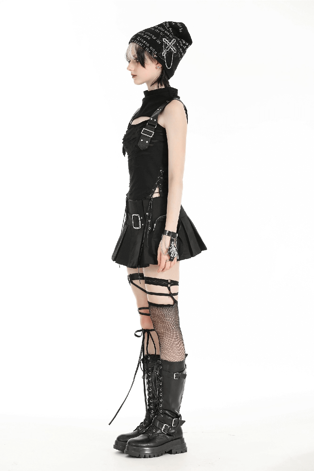 Model showcasing a Gothic Punk sleeveless ripped top with buckle straps, paired with edgy accessories.