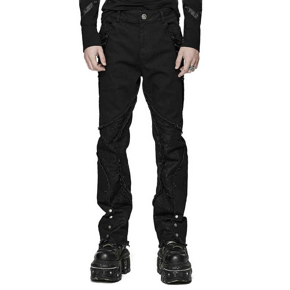 Gothic punk spider mesh paneled pants featuring eyelets and black cracked leather details, perfect for edgy urban fashion.