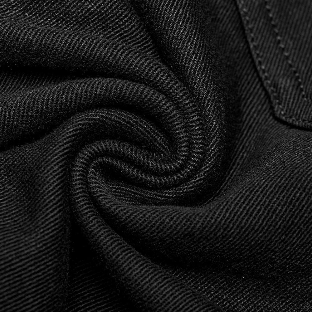 Close-up of soft black twill fabric, showcasing its durable texture and quality for gothic punk pants.