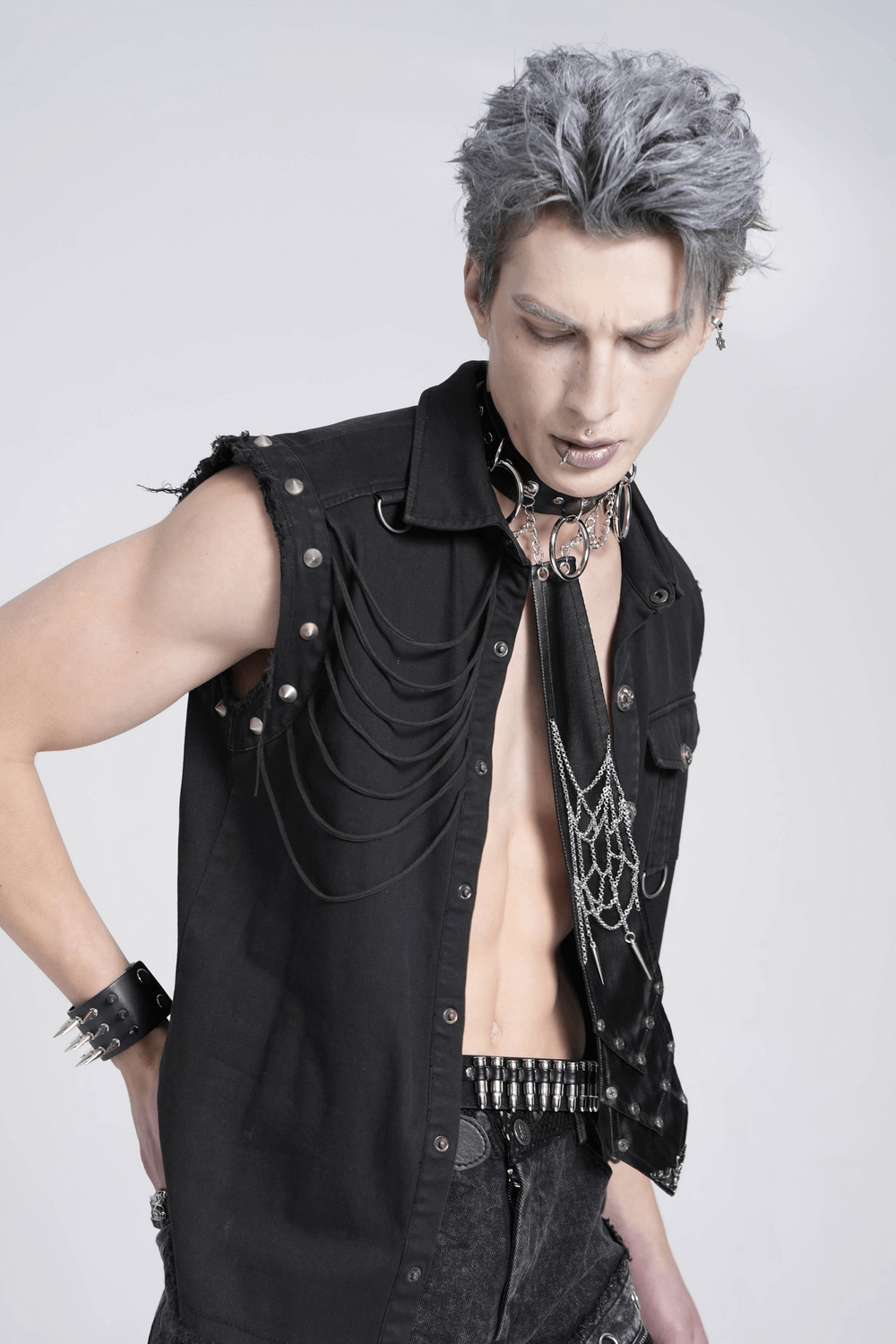 Model showcasing a Gothic Punk Spider Web Chain Necktie with studs, embodying dark elegance and edgy style.