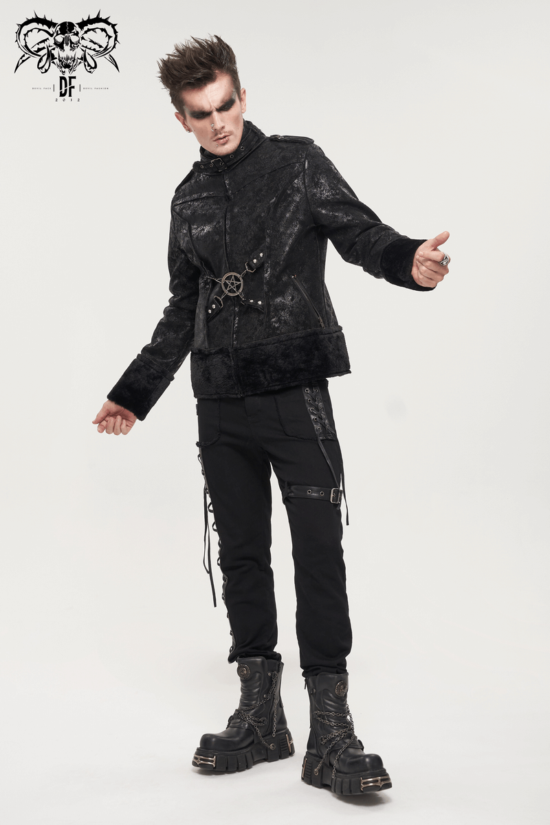 Fashionable man in black gothic punk outfit with lacing pants and chunky boots, showcasing modern punk style.