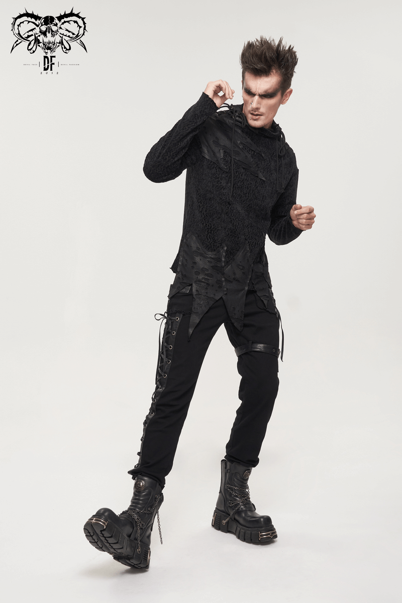 Stylish model showcasing gothic punk black trousers with lacing and buckle belt, paired with edgy combat boots.