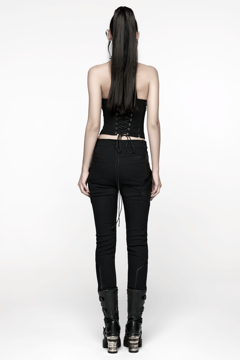Model wearing Gothic Punk Techwear Pants with Leather Panel Details, showcasing stylish back view.