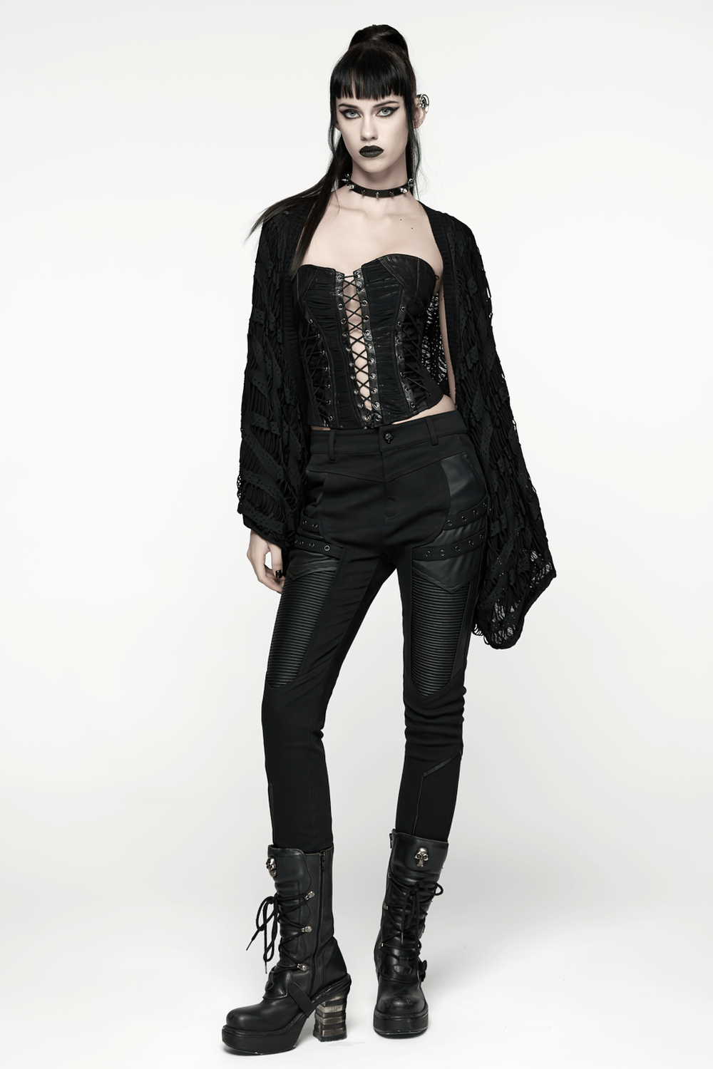Model in Gothic Punk Techwear Pants with Leather Panel Details against a white background.
