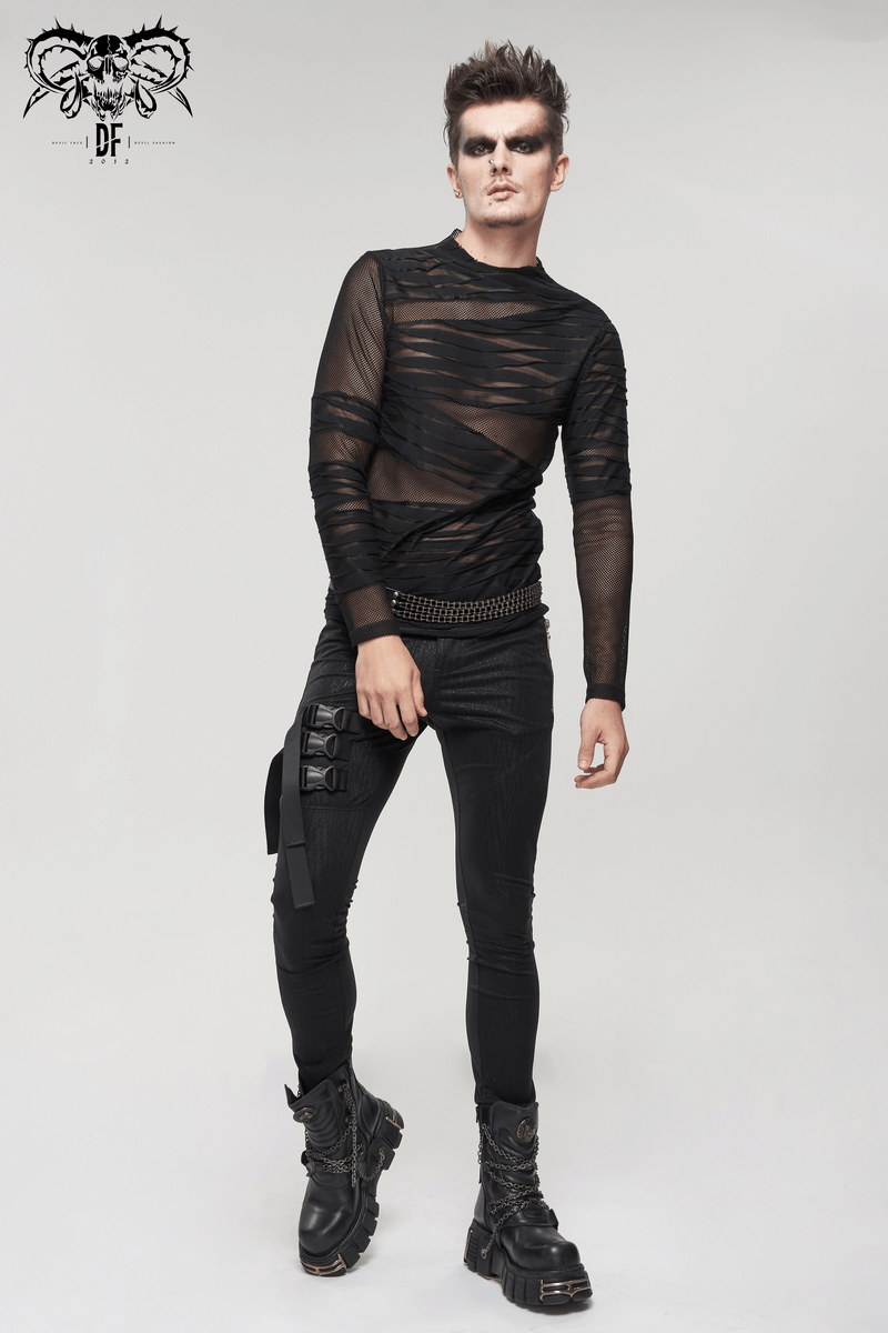 Male model in a gothic punk black transparent long sleeve top, showcasing stylish urban fashion.