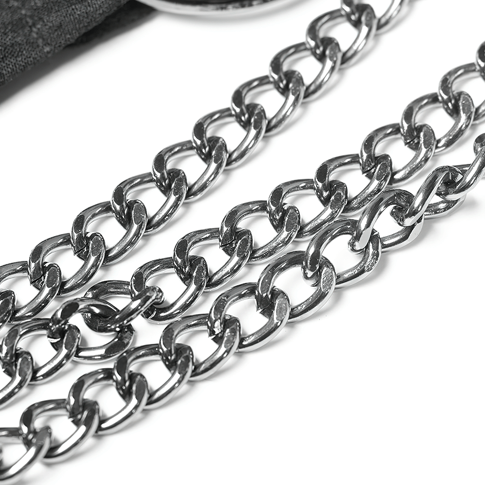 Close-up of shiny silver chain links for a gothic punk cape, adding edgy detail and style.
