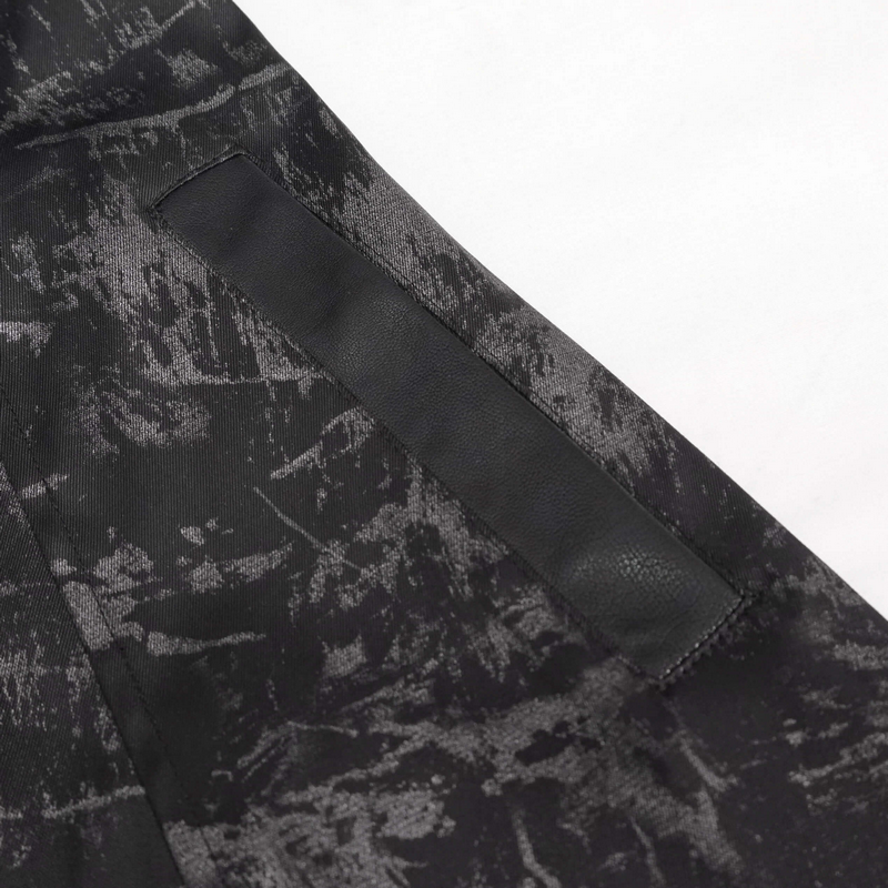 Detail shot of the textured fabric and leather patch on the Gothic Punk women's hooded long coat.