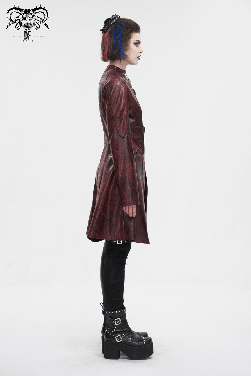 Side view of a model in a gothic punk faux leather mid-length coat, showcasing edgy style with double buckles and chunky boots.