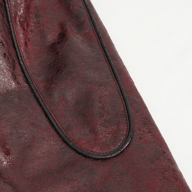 Close-up of the textured burgundy faux leather detailing on a gothic punk coat.