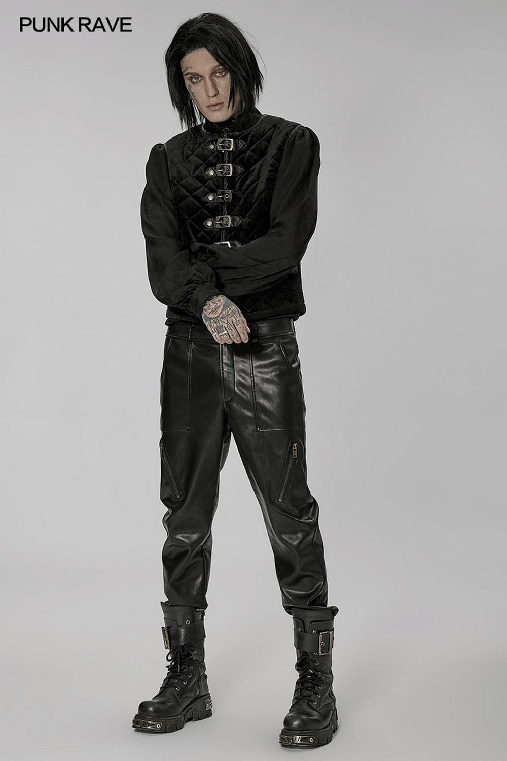 Gothic quilted men's waistcoat with metal clasp closure, paired with leather pants and boots, showcasing stylish punk fashion.