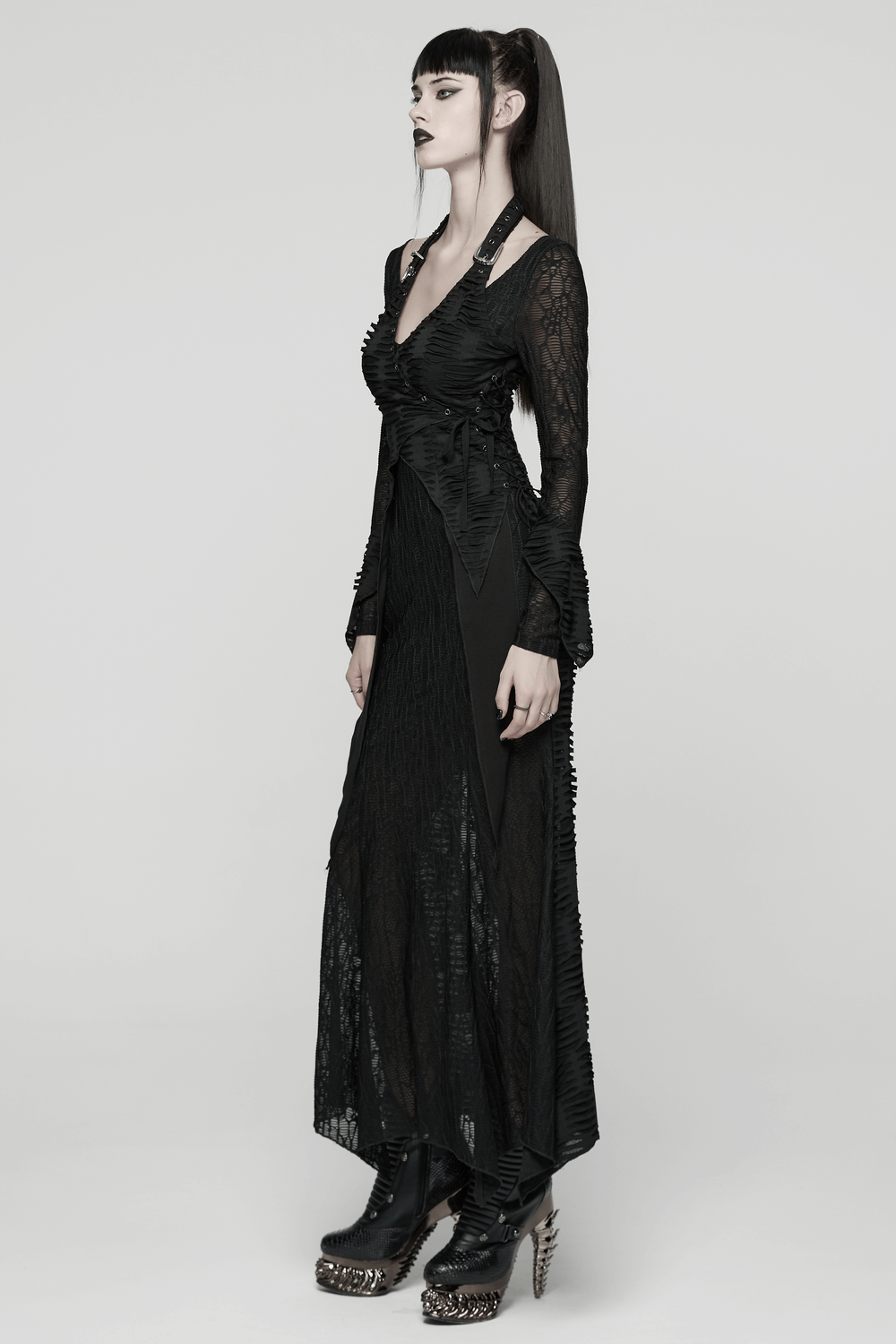 Gothic Ragged Knit Mesh Dress with Fish-tail Hem showcased on a model, featuring unique D-ring details and a dramatic silhouette.