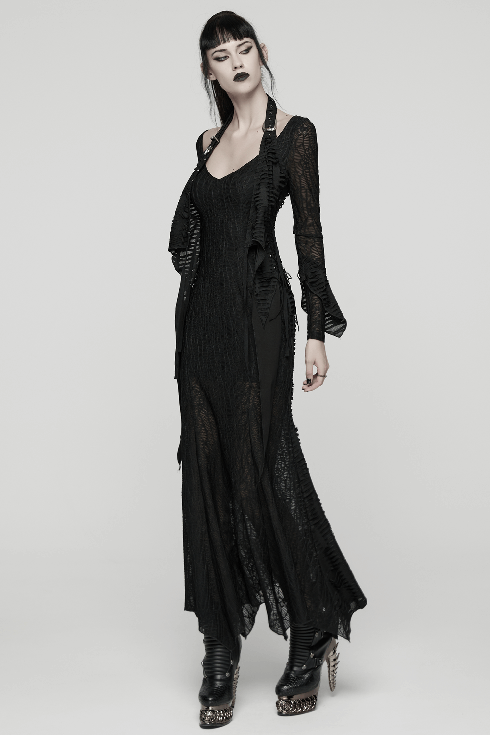 Gothic Ragged Knit Mesh Dress with Fish-tail Hem worn by model, showcasing punk style and unique design features.