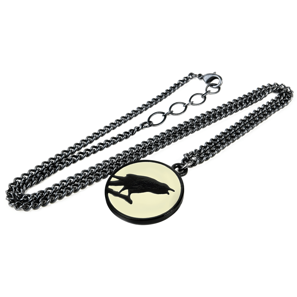 Gothic Raven Pendant with Moon Glow Medallion on a black chain featuring a raven silhouette and luminous moon backdrop.
