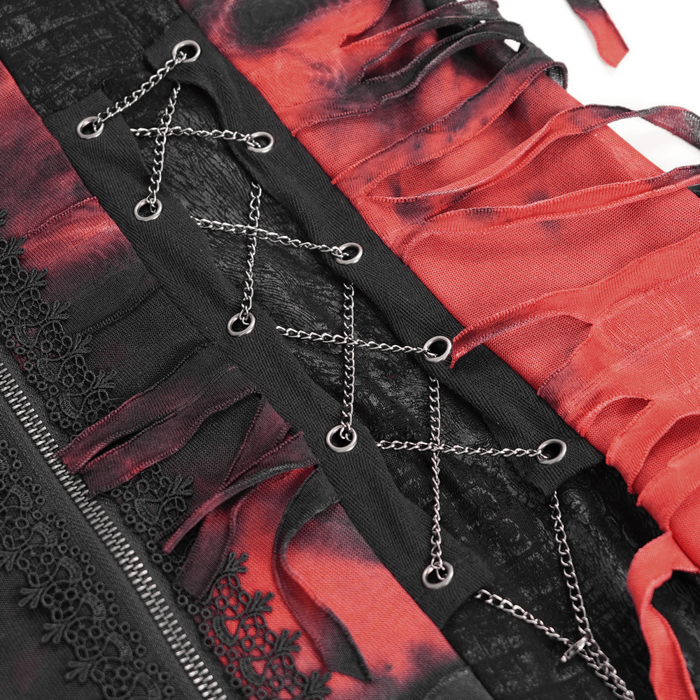 Close-up of gothic red and black hooded cape showcasing lace-up accents and tattered details for a dark alternative style.