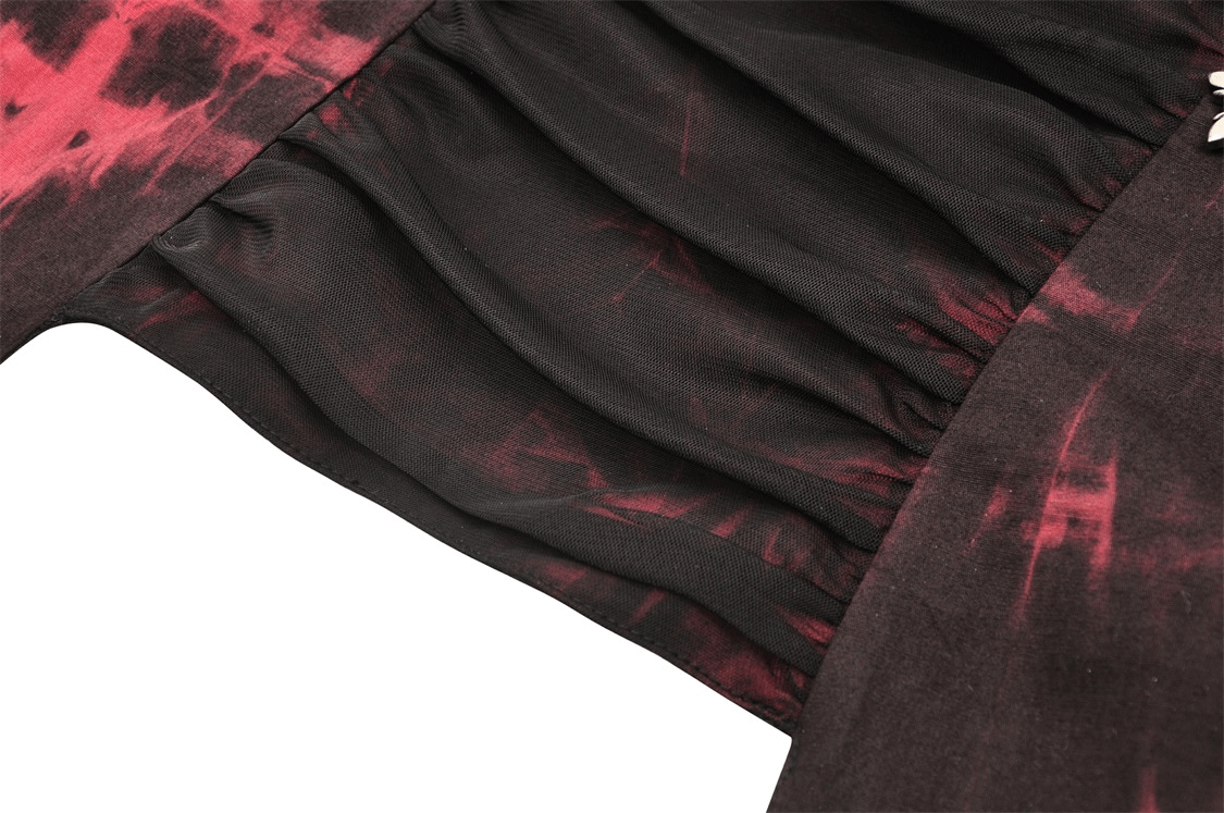 Close-up of the elegant ruching detail on a Gothic red and black frill corset top, showcasing its bold design.