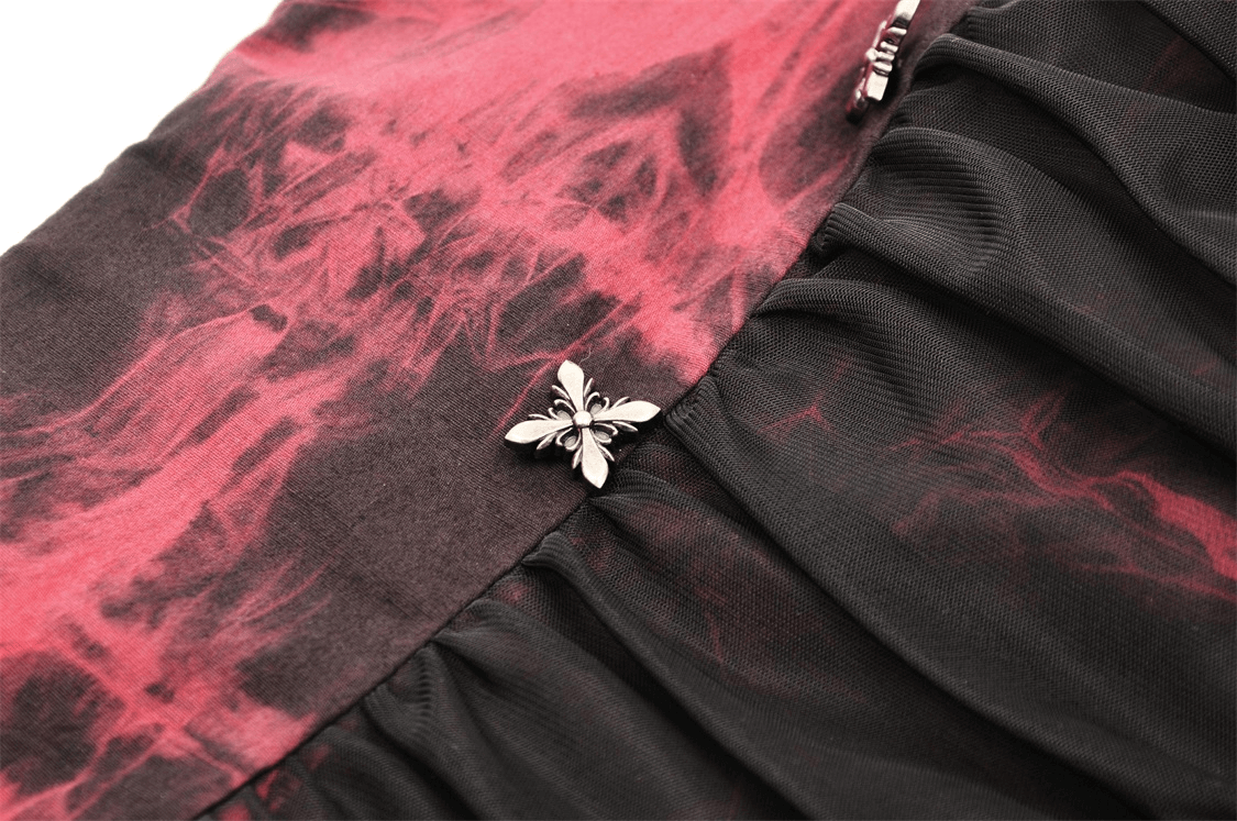 Close-up of Gothic red and black frill corset with unique ruched design and decorative silver accent.