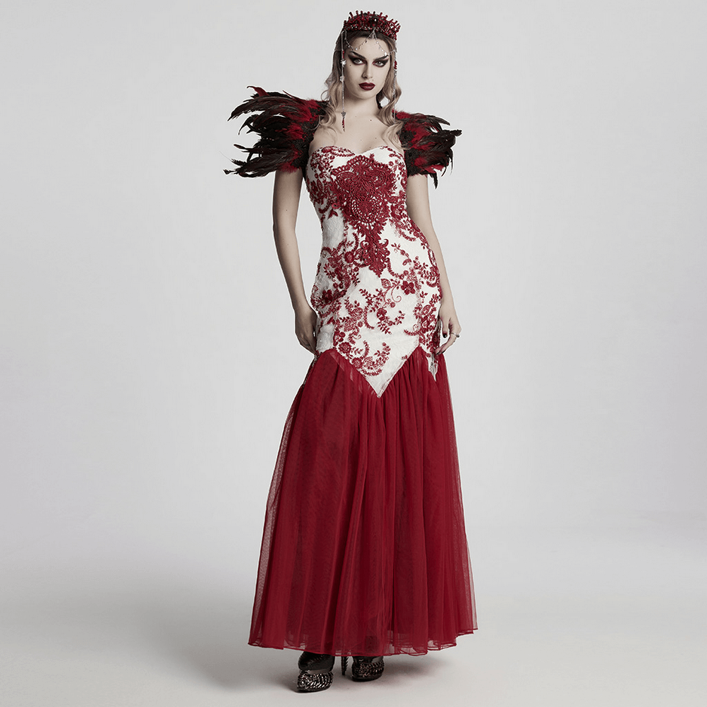 Gothic red crystal crown and elegant gown with feathered shoulders and intricate embroidery for alternative fashion.