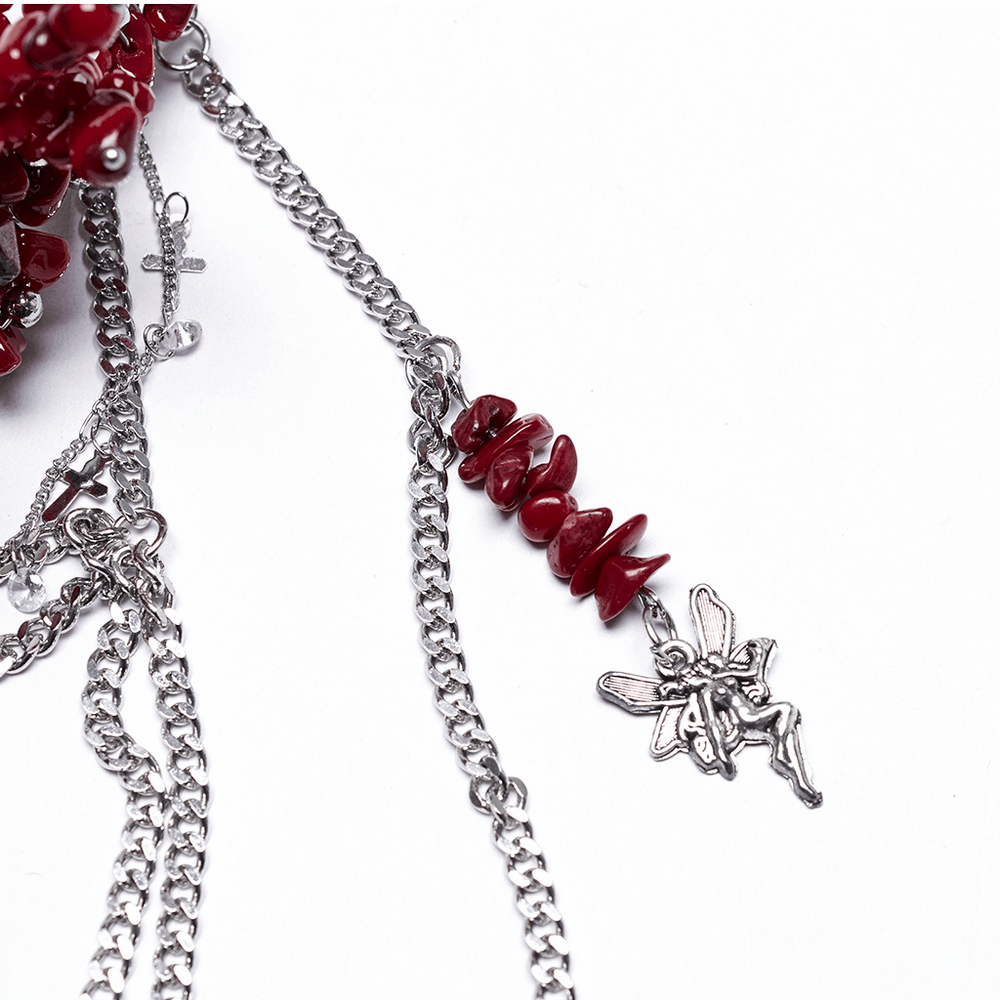 Gothic red crystal crown featuring silver tassels and chains, perfect for alternative fashion lovers.