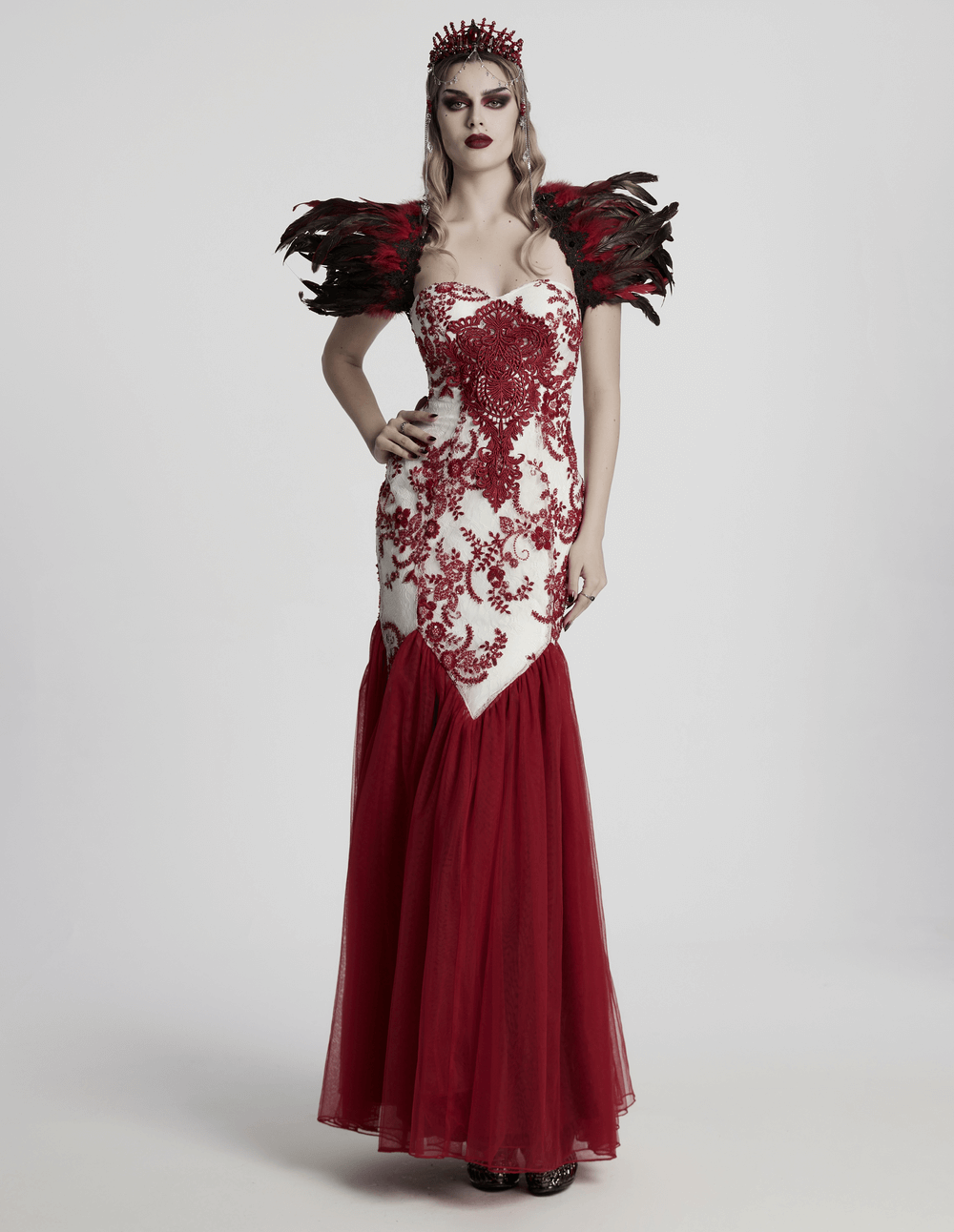 Elegant Gothic red dress with intricate embellishments and dramatic feather shoulders, exuding a mysterious style.