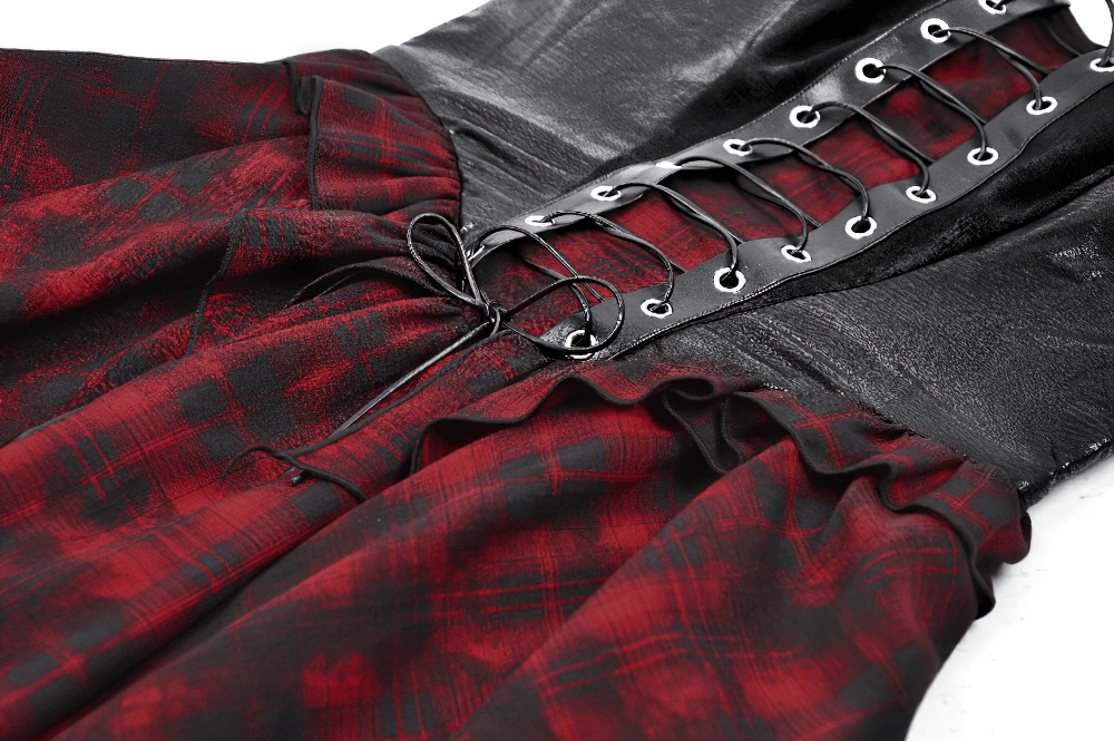 Gothic red plaid and leather dress featuring lace-up details for a bold fashion statement.