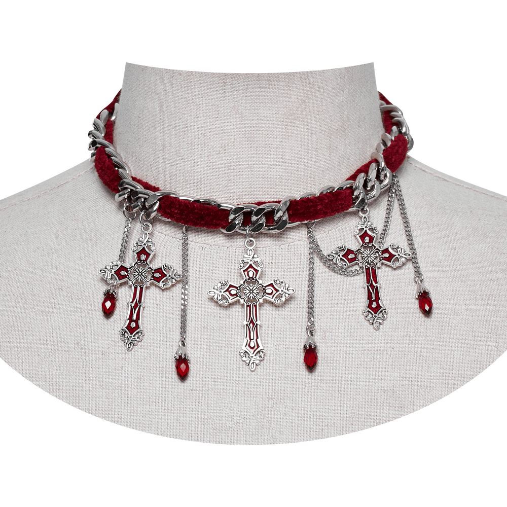Gothic red velvet choker necklace with cross pendants and chain tassels, perfect for an elegant edgy look.