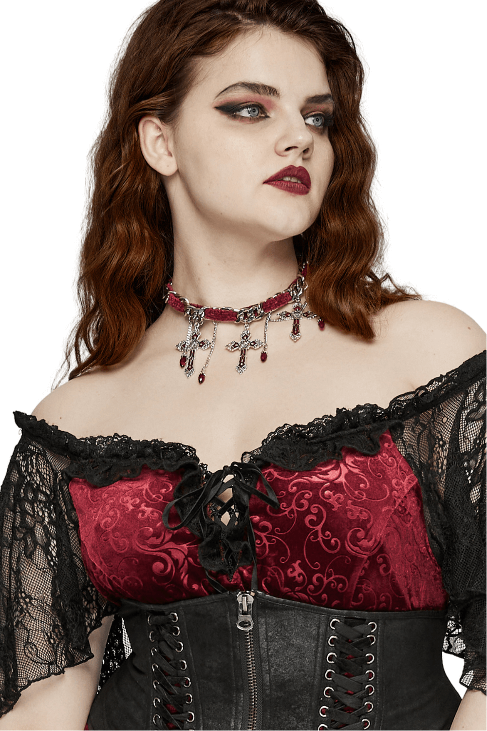 Elegant woman wearing a Gothic red velvet cross choker necklace with tassels and stylish outfit.