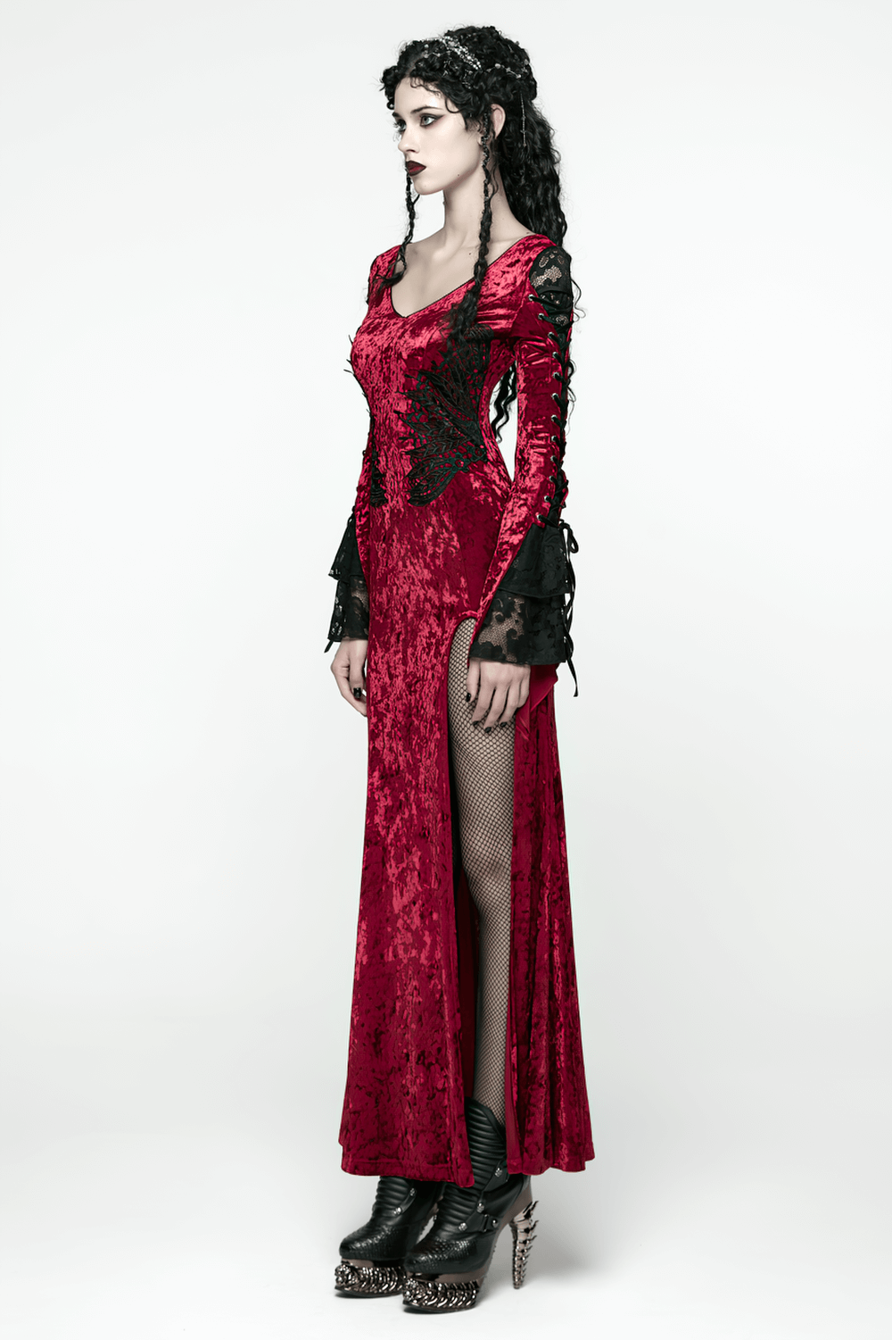 Gothic Red Velvet Dress with Lace-up Back and High Slit on elegant model with edgy style.