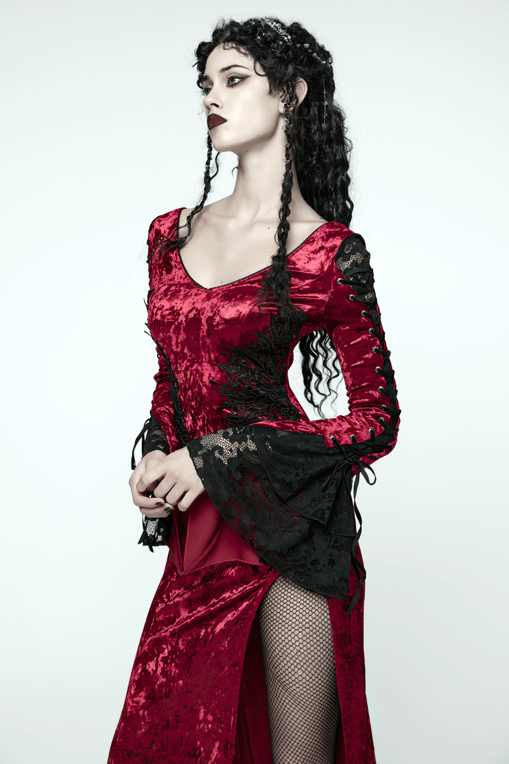 Gothic Red Velvet Dress with Lace-up Back and High Slit showcasing a stunning model.