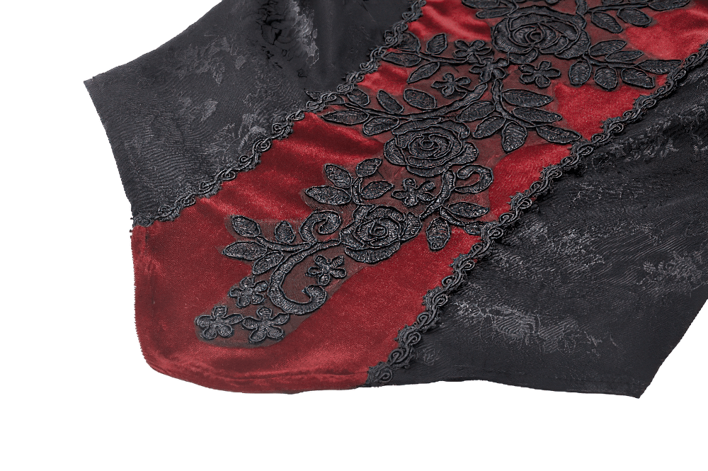 Close-up of Gothic red velvet with intricate black lace detailing, showcasing elegance and Victorian-inspired fashion.