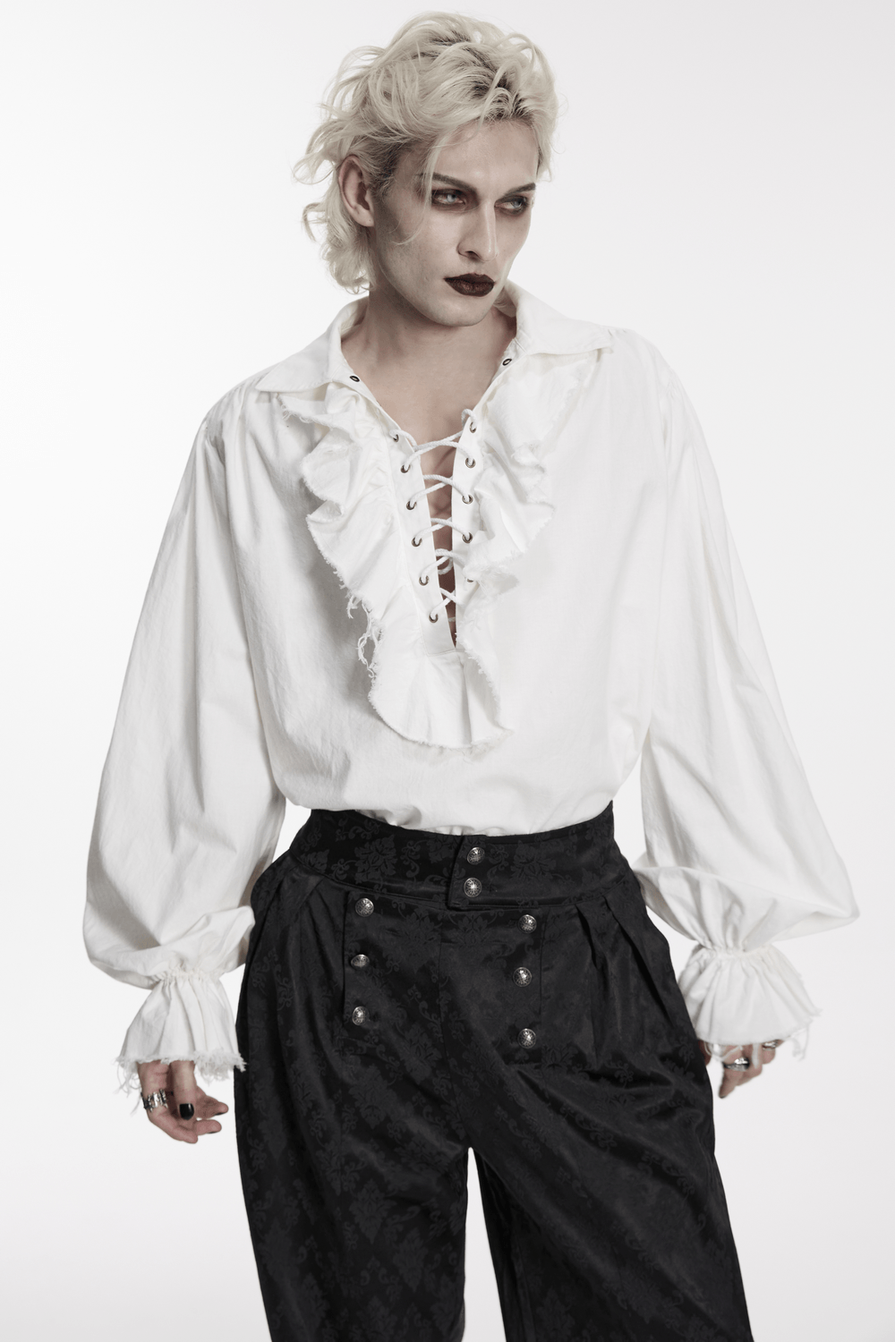 Gothic Retro Shirt with Bubble Sleeves and Ruffles worn by model featuring ruffled front and lace-up details.