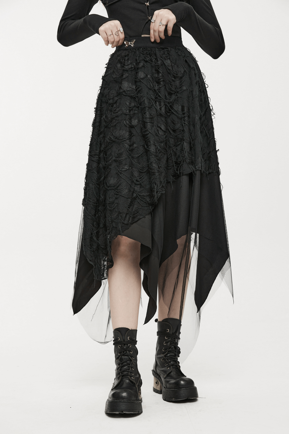 Gothic ripped butterfly asymmetrical mesh skirt showcasing edgy layered design and a playful, rebellious spirit.
